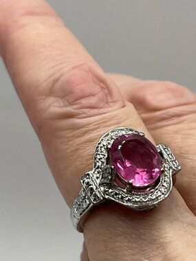 Pink quartz set in caviar bead design, S925 setting. Oval stone elongates finger